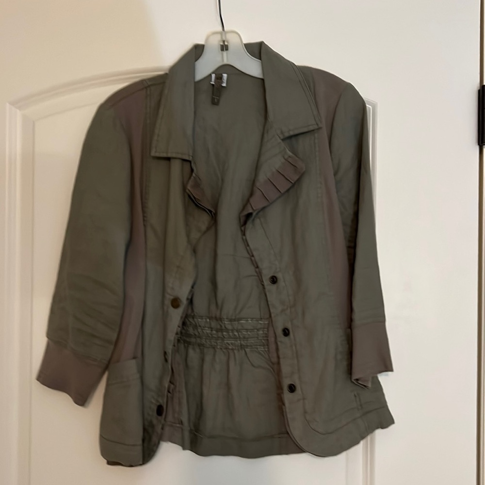 Khaki green. Side panel is stretchy